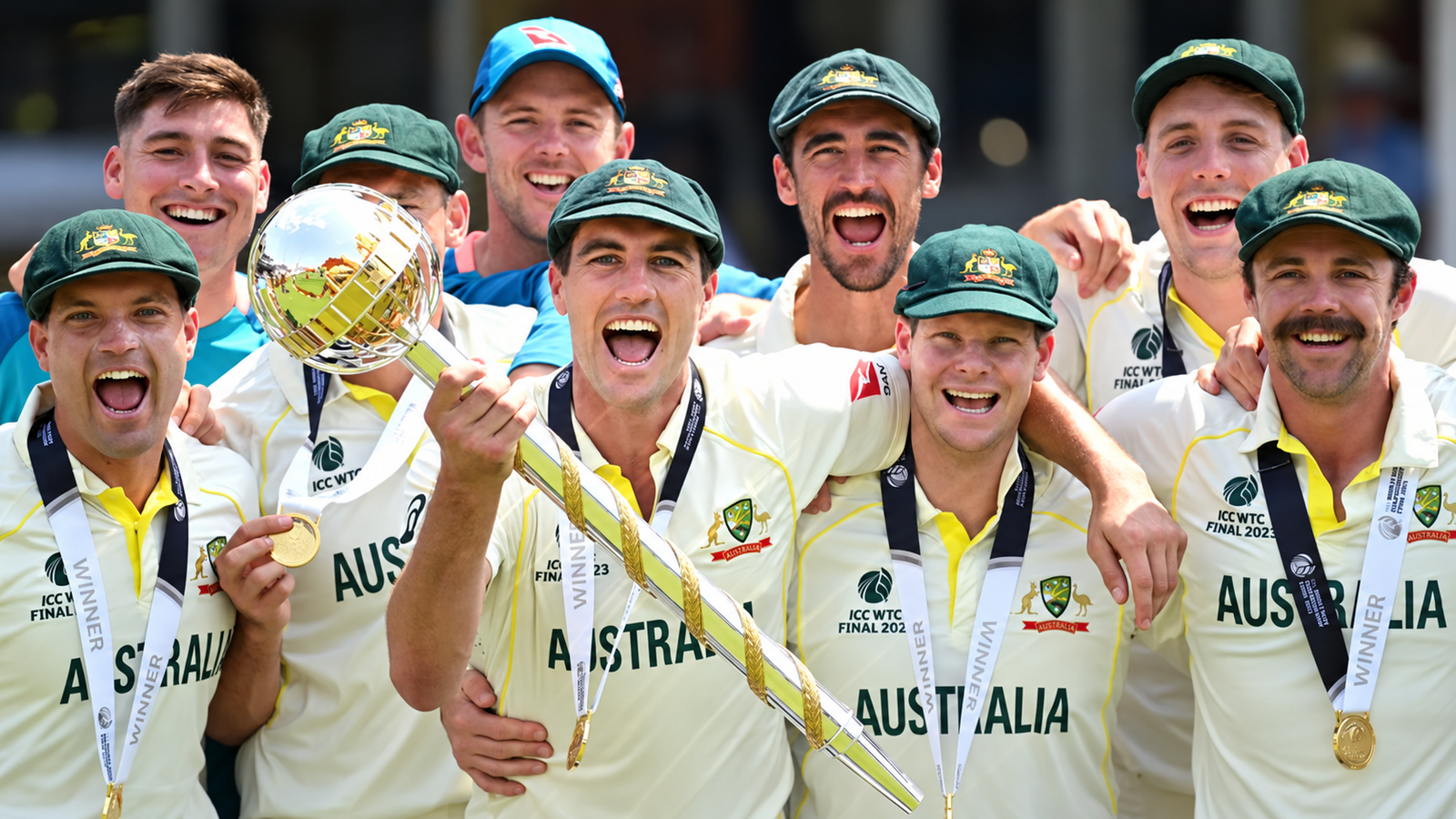 Australia players celebrating with the World Test Championship trophy