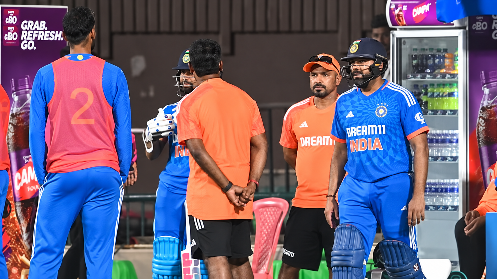 India cricket players and support staff preparing near the dugout