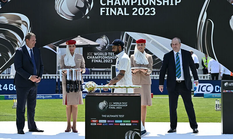 Virat Kohli walks past the World Test Championship trophy during the 2023 final presentation